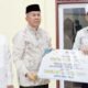 DPRD Wajo menyerahkan wakaf 200 Al-Qur’an pada kegiatan Tabligh Akbar Isra Mi’raj di Masjid Baiturrahman