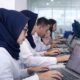 asn bekerja dengan sistem digital dalam tata kelola ikn untuk mendukung smart governance dan integrasi layanan