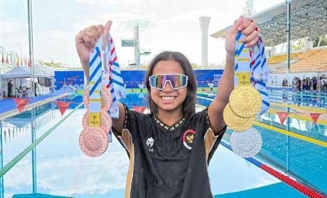 siti aisyah atlet para renang indonesia meraih dua medali emas di asean para games 2025 thailand