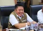 gubernur sumatera selatan herman deru tersenyum saat rapat pkdn sespimti polri di palembang