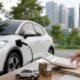 Ilustrasi mobil listrik dan perhitungan pajak kendaraan tahunan di Indonesia